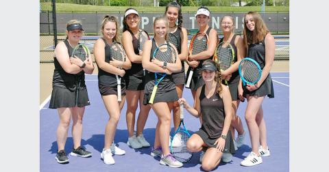 The LCHS Girls Tennis team stopped for a photo before defeating Sonoraville High School in the first round of the state playoffs on Friday.