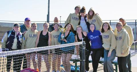 The LCHS Girls Tennis team celebrates its Region Tournament Championship after beating Cherokee Bluff in the finals of the tournament on Thursday, April 1. With the tournament win, the team is positioned for a state tournament run as a No. 1 seed. (photo by Esteban Ramirez)