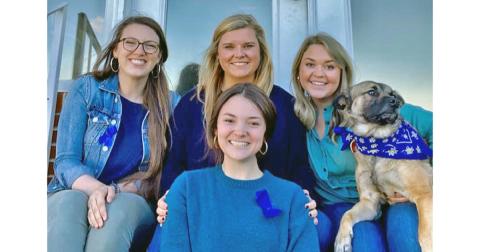 South Enotah Child Advocacy Center members are, from left, Executive Director Rebekah Perethian, Forensic Interviewer Kylee Martin, Family Advocate Carlyn Hearn, Facility Dog Jake Martin and, front, Family Advocate Megan Holcombe.