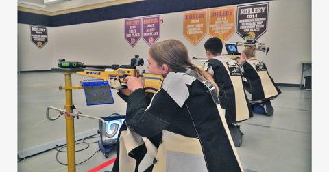 Pictured (from left): Launie Coleman, Joshua Molina and Ansley Gilstrap practice their shooting process before their State Finals appearance. The three, along with Liv Lusky and Maddy Moyer represented the LCHS Rifle team in the GHSA State Rifle Championship where the Indians came away with an eighth place finish.