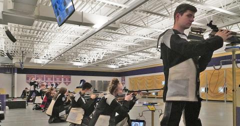 Team Captain Anthony Bauer (right) and the rest of the LCHS Rifle team set their sights on the ultimate prize, a state championship title. The team will be competing at the GHSA Three-Position Air Rifle State Championship on April 24 in Griffin.