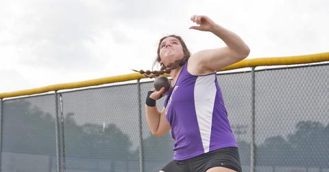 Grace Jones launches her shot put attempt during the Area Track Tournament at White County High School, claiming region champion in the event and qualifying for sectionals.