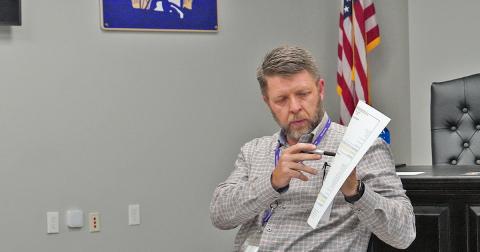 Lumpkin County Schools Chief Financial Officer Shannon Christian goes over the proposed 2022 budget during the school board's public hearing on Monday, June 21.