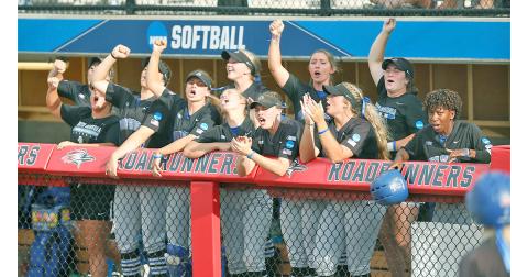 The Nighthawks let out a cheer during the team’s second game at the NCAA Division II Softball Championships in Denver, where the team beat Valdosta State 8-4 to stay alive in the tournament.