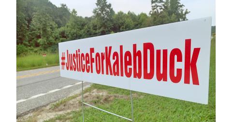 Signs honoring Kaleb Duckworth have been showing up along local roads.