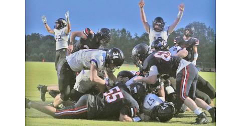 LCHS senior lineman Ricky Hicks plows ahead for two yards and the touchdown on a crucial fourth down play during the Indians’ scrimmage against Lakeview Academy on Friday. Head Coach Caleb Sorrells said his team starts and ends with the play of his veteran line this season, as the entire starting line from last season returned to the team in 2021.