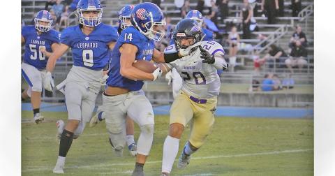 Senior Daniel Brinson goes for a tackle against the Banks County ball carrier during Friday night’s game against the Leopards. The Indians fell 26-16 on the night.