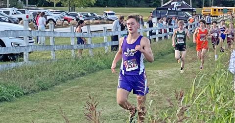Wyatt Windham pushes on during his run at the Harrier Harvest Meet at Tallulah Falls on Tuesday, Oct. 19, finishing in 10th place and leading the boys to a fourth place overall finish. The girls team also joined the boys with a fourth place finish in the teams’ final tune up before the region meet scheduled for today.