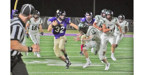 Lumpkin sophomore Mason Sullens avoids would-be tacklers with a huge run for Lumpkin’s longest play of the night before eventually punching the ball in for the Indians’ lone score against North Hall.