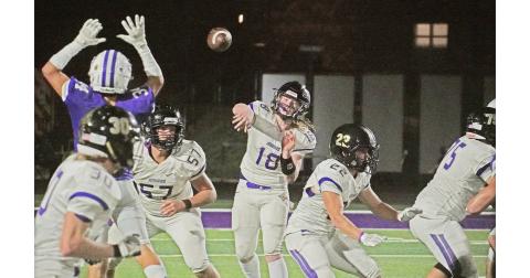 LCHS quarterback Cooper Scott throws a pass while looking through the large hands of the Cherokee Bluff defensive end. The pass ended up in the hands of receiver Cal Faulkner, after being tipped away near its original target, who found himself in the right place at the right time to make the snag.