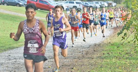 Lumpkin’s Wyatt Windham runs near the front of a pack of runners during the Mountain Invitational at Unicoi State Park last week. Windham went on to finish 15th overall with a time of 18:16, just behind teammate Ben Sherrill who finished 14th to lead the way for the Indians.