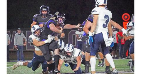 Lumpkin quarterback Cooper Scott is sacked by the White County defensive front after trying to scramble out of trouble during Friday night’s 49-13 loss.