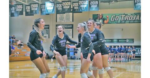 The Indians celebrate a point during their Region Tournament match against North Hall during Day 2 of the 7 AAA  Region Tournament on Thursday.