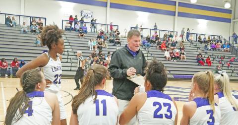 Lumpkin County High School’s now former head coach David Dowse addresses his team during a timeout in its season opener on Thursday, Nov. 18. According to principal Billy Kirk, the plan is to get through this week and into Thanksgiving break before likely announcing an interim coach on Monday, Nov. 29.