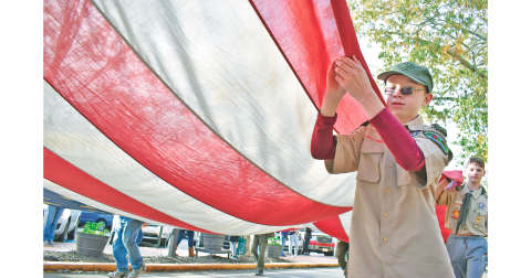 Pictured: Nolen Padgett (front) and Ethan Lawson were among many who participated in last weekend’s annual Veterans Day parade through downtown.