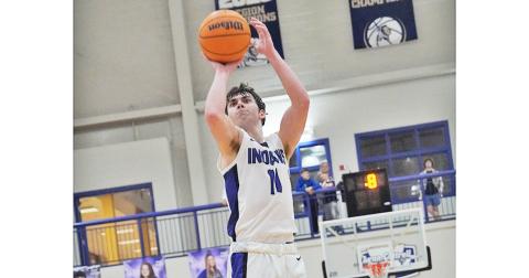 Senior Jones Harris takes aim from three-point range late in Lumpkin’s win against East Forsyth. Harris came in clutch in both of the Indians’ wins on the week.