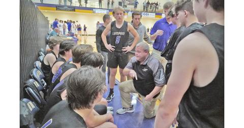Head coach Michael Parker draws up a play late in Lumpkin’s close loss at Union County on Thursday. The Indians had a chance to tie with 0.5 seconds left, yet were unable to convert the needed basket, falling 55-53.