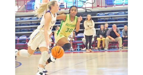 Lexi Pierce presses up the court with the ball in an attempt to open things up against Buford’s full court press during the Indians’ Day 2 game against the Wolves.