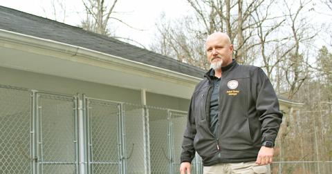 In this photo from January 2020, Lumpkin County Animal Shelter manager Wayne Marshall shows some of the existing dog kennels at the current facility.