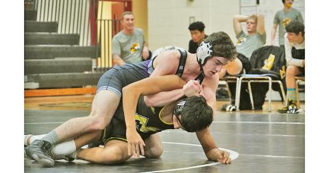 Lumpkin wrestler T.J. Payne maintains complete control of his opponent on the mat, eventually holding on for a decisive 2-1 win in his match on Saturday.