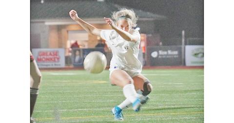 Bri James takes a shot from distance in an attempt to add to Lumpkin’s lead in the second half versus Dawson County on Friday. James eventually connected on a long distance shot, netting the fourth of five goals for the Indians on the night.