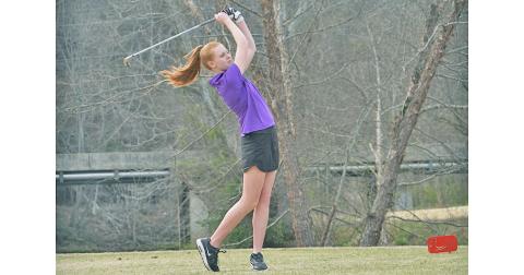 Sophomore Harper Hubbard sends a drive off the tee during Tuesday’s match versus Fannin County. Hubbard shot the low score of the round for Lumpkin on the girls side with a 51. 