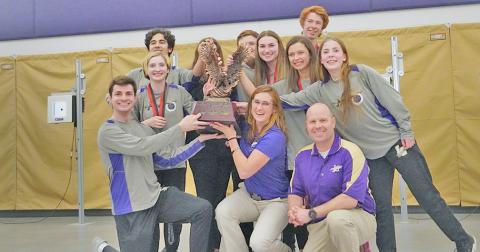 Members of the LCHS Rifle team celebrate with the elusive Area 6 trophy after defeating all six teams in the area to claim the title and No. 1 seed heading into the State playoffs.