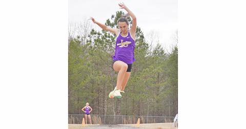 Senior and team captain Mercades Housman takes first place in Triple Jump, an event she went all the way to the state finals in last season.