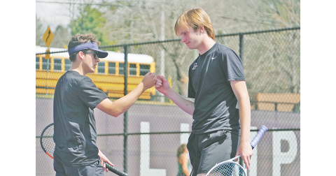 Doubles No. 1 teammates (from left) Jack Lowry and Jack McKinney celebrate after a point during Lumpkin’s Region Tournament matches.