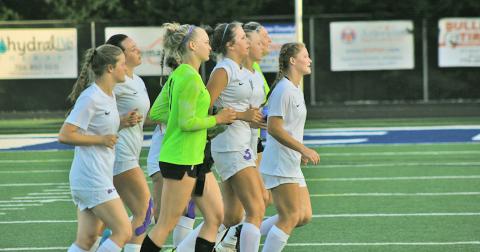 The LCHS Girls Soccer team jogs off to thank their supporters one last time in the 2022 season as the team fell just short of advancing to the Final Four with a 2-0 loss to Oconee County on Monday.