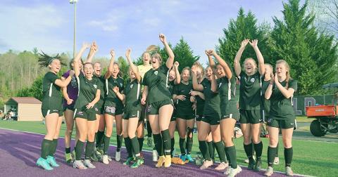 The LCHS Girls Soccer team celebrates its first-round win over Sandy Creek last Tuesday. After Monday’s win over Pierce County, the Indians are Elite Eight bound.