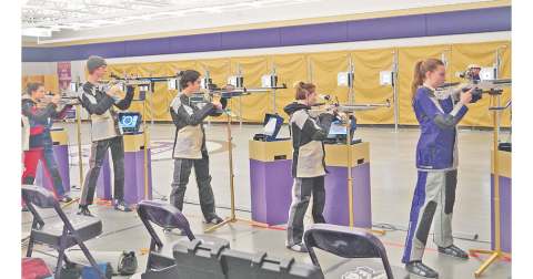Lumpkin’s five eligible to score shooters (from left) Rebecca Chester, Jake Gary, Joshua Molina, Liv Lusky and Maddy Moyer each take on the standing position, known to be the hardest of the three shooting positions. Head coach Ruthanne Conner said she felt this position is where her team separated itself from the opponents in its semifinal victory to send the team to the state finals.