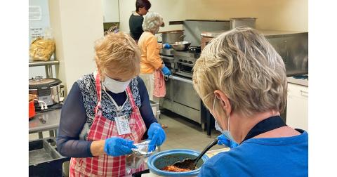 Volunteers at Dahlonega United Methodist Church prepare a hearty meal for curbside pick up last year for the Annual Spaghetti Supper to benefit Jeremiah’s Place.