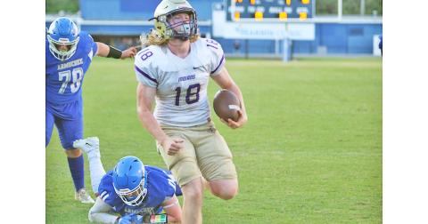 Rising senior quarterback Cooper Scott leaves a wake of would-be tacklers in the dirt before stepping into the end zone for the touchdown during Friday’s Spring Scrimmage 48-0 win over Armuchee High School. Scott threw for a touchdown and ran for two more in the game.