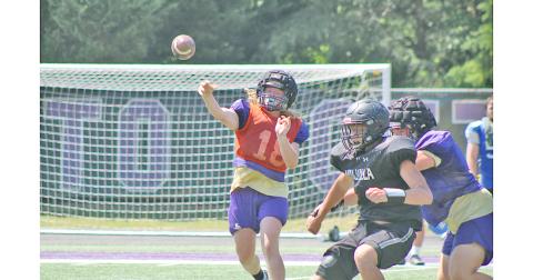 Rising senior Cooper Scott delivers a pass during a skill position scrimmage during last week’s football camp. Lumpkin played host to four other teams for a two-day padded camp to add some extra competition to their practices this summer.
