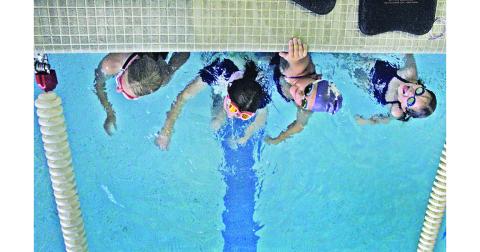 The Lumpkin County Parks and Rec Swim team is preparing to send 19 swimmers to compete at the GRPA State meet in Tifton this weekend. Pictured (from left): Lily Weber, Abagail Herrit, McKenzie Wiggington and Elsie Grizzle.