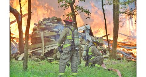 An old cabin off Camp Wahsega Road was brought to the ground in a matter of minutes after a suspected lightning strike hit the abandoned structure on Saturday. Firefighters from both Camp Frank D. Merrill and Lumpkin County Emergency Services responded to the scene.