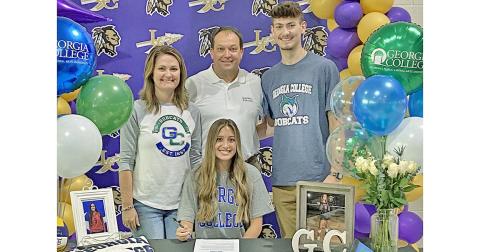 Kiersta Trammell signed to play college volleyball with Georgia College in a signing ceremony with her family before graduating last spring.