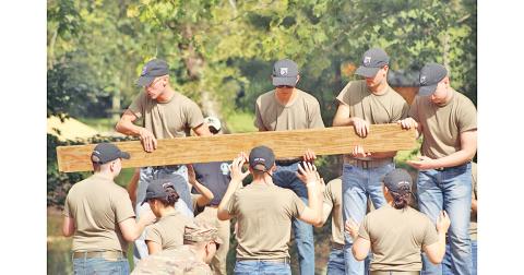New University of North Georgia cadets get an intense lesson in teamwork while joining forces at the Pine Valley Outdoor Recreational Facility during FROG (Freshmen Recruit Orientation Group) Week.