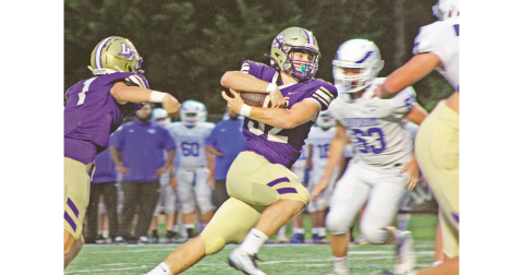 Junior fullback Mason Sullens (32) rushed for 121 yards on 13 carries and scored four touchdowns as Lumpkin won its season opener.