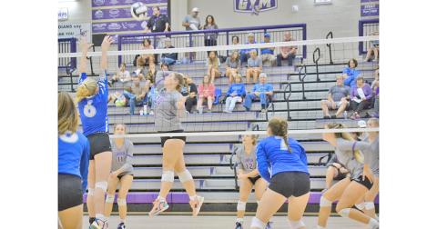 Lumpkin County middle hitter Mary Richardson (20) returns a volley during the Lady Indians match vs. Fannin County last week.