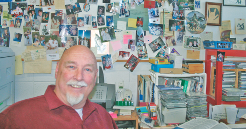 Rev. Frank Colladay's two favorite things were ministering to young people, and performing weddings. This is a 2008 photograph of his office wall, full of images of babies, toddlers, teens and the newly married from 26 years of pastoring Dahlonega Presbyterian Church.