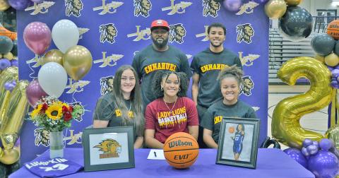 Kate Jackson celebrates her scholarship signing along with (front row, left) mother Janet Jackson, sister Keira Jackson, (back row) dad Patrick Jackson and brother Pat Jackson.