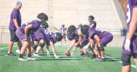 The varsity football team prepares for their game this Friday at White County.
