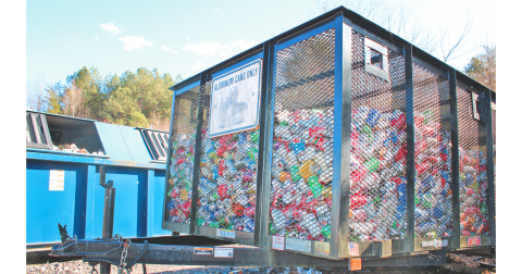 A trailer full of aluminum cans awaits recycling near the county landfill.