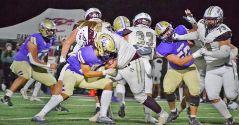 The Lumpkin defense held strong for nearly three quarters, but Dawson eventually overcame the Indians with a strong ground game to pull away for the win.