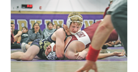 Lumpkin sophomore Nathan Nielsen pins his Chestatee opponent at last week’s home meet. Nielsen also finished in second place at the Indians’ season opening meet. (Photo by Carrie Dawn Roy)