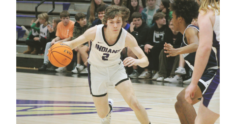 Lumpkin senior Clayton Woodham takes on a West Hall defender in Friday night’s home game.