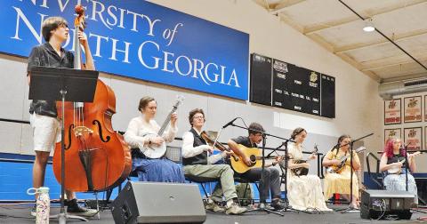The members of the Licklog String Band perform at a spring contra dance at the University of North Georgia. (Photo by Sharon Tran)