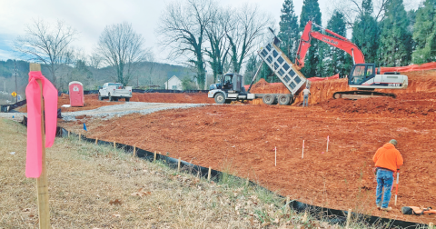 The members of the Dahlonega City Council will allow developers of a downtown dentist office to proceed without adding sidewalks.